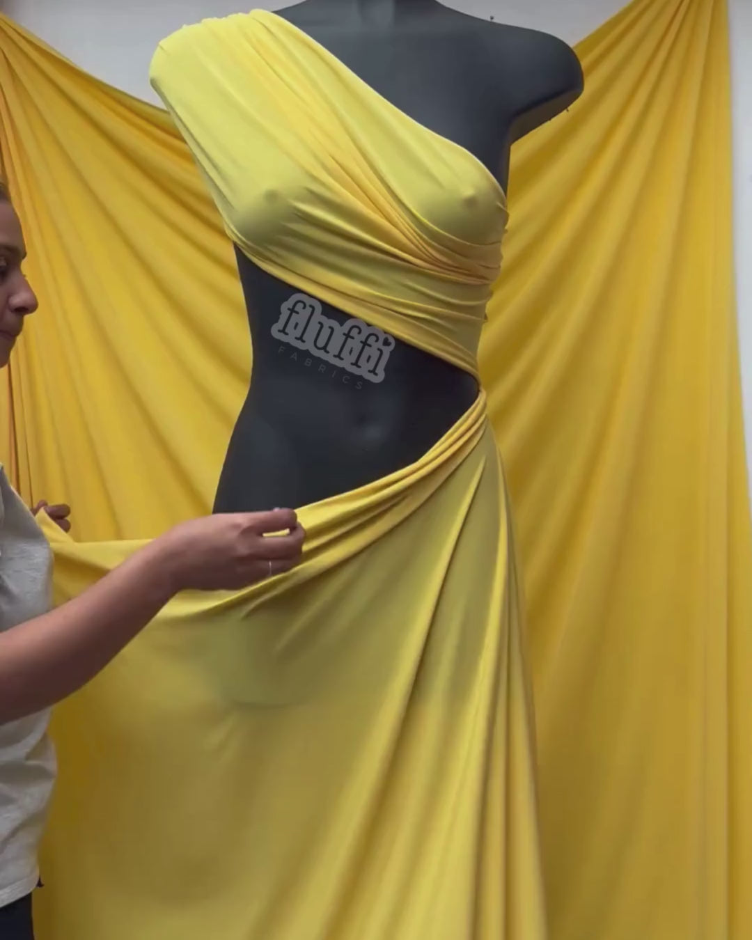 Load video: Soft Touch Jersey Stretch Dressmaking Fabric Yellow